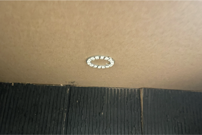 I installed the light at the top of the sensory room by hooking the light onto the wires so it would then work seamlessly. The wired were poking through little holes in the top of the box to connect to the light.